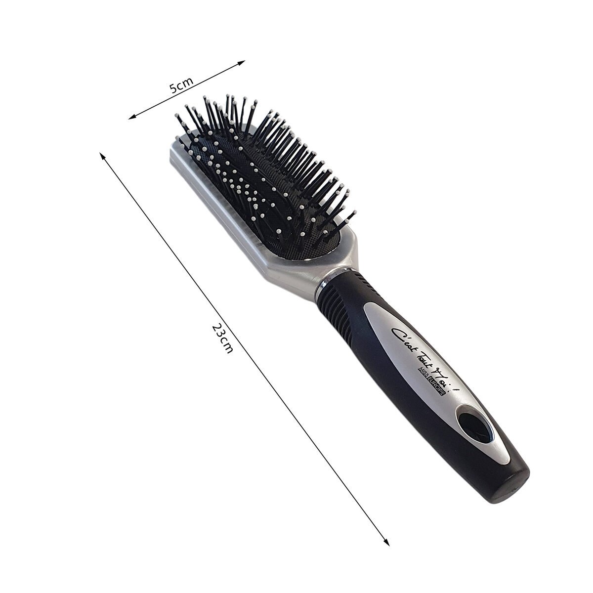 Hair brush with spiked ball finish on a black/silver plastic air cushion C'est Tout Moi!